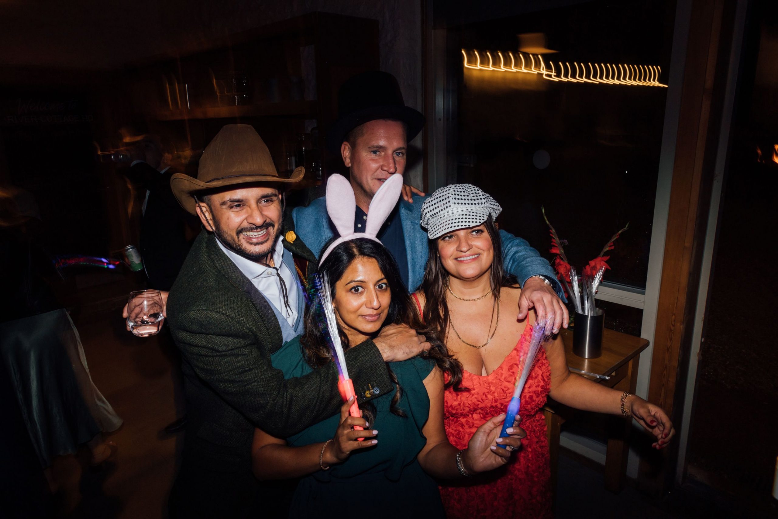 Wedding guests getting into the party spirit at River Cottage