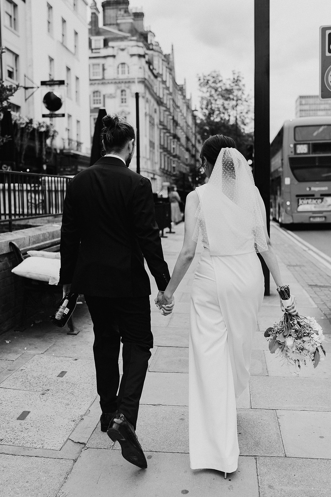Bridal jumpsuit for chic, stylish intimate city wedding