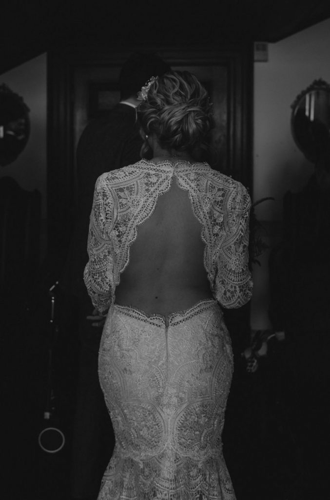 An open backed, long sleeved, lace Wtoo by Watters wedding dress for spring bride Jade