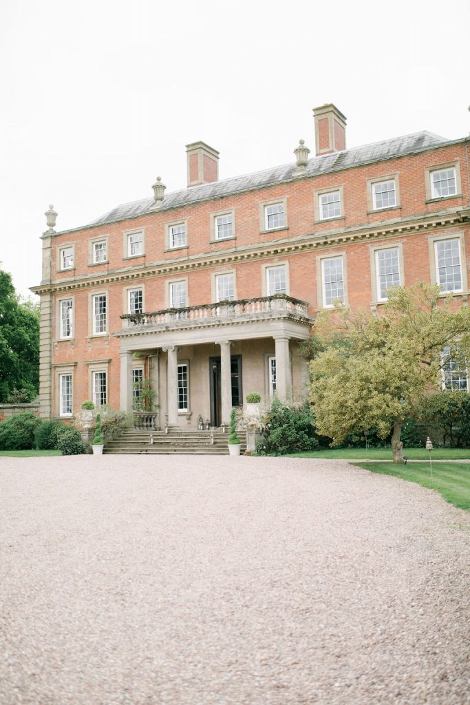 An elegant and romantic pink and gold wedding at Davenport House with two Milla Nova dresses