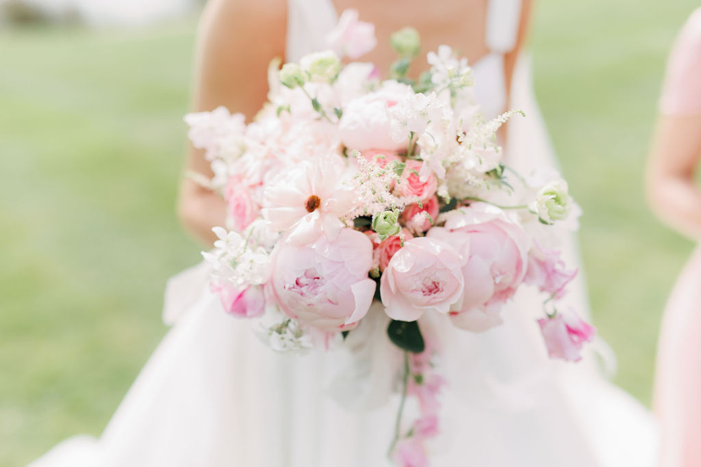 An elegant pink and gold wedding at Davenport House with two Milla Nova dresses