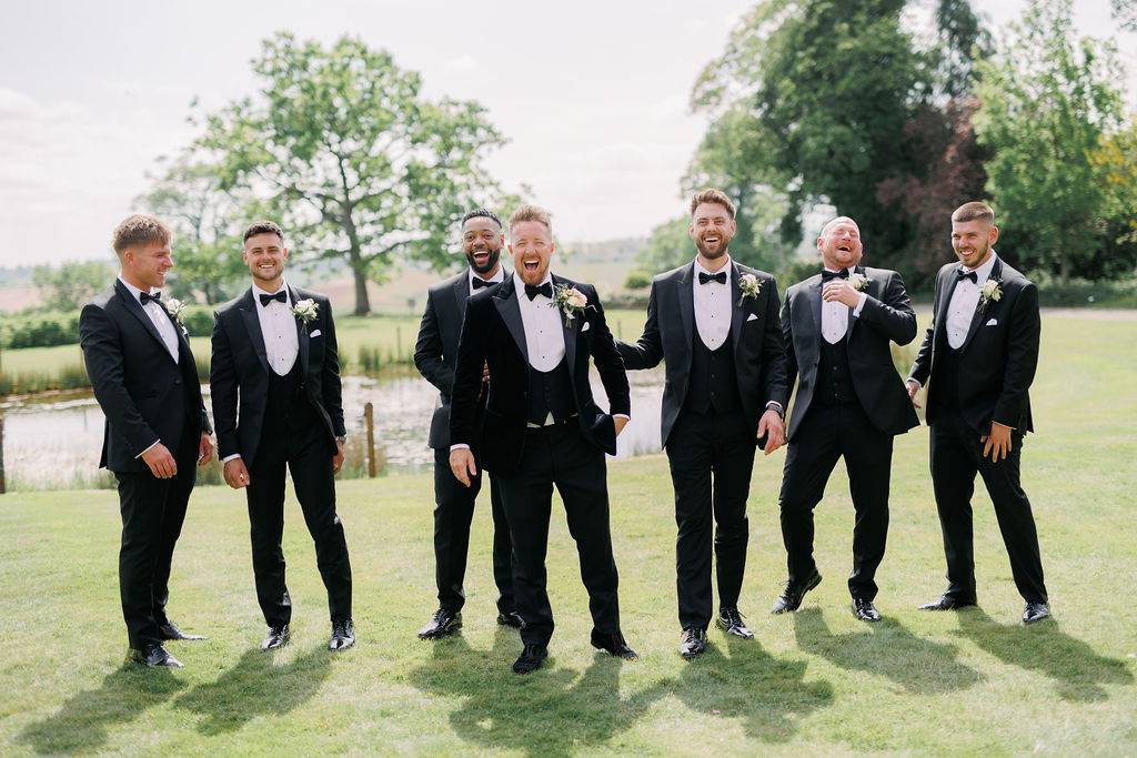 An elegant pink and gold wedding at Davenport House with two Milla Nova dresses