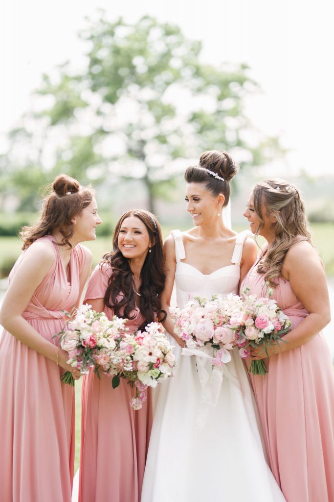 An elegant and romantic pink and gold wedding at Davenport House with two Milla Nova dresses