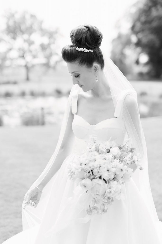 An elegant and romantic pink and gold wedding at Davenport House with two Milla Nova dresses