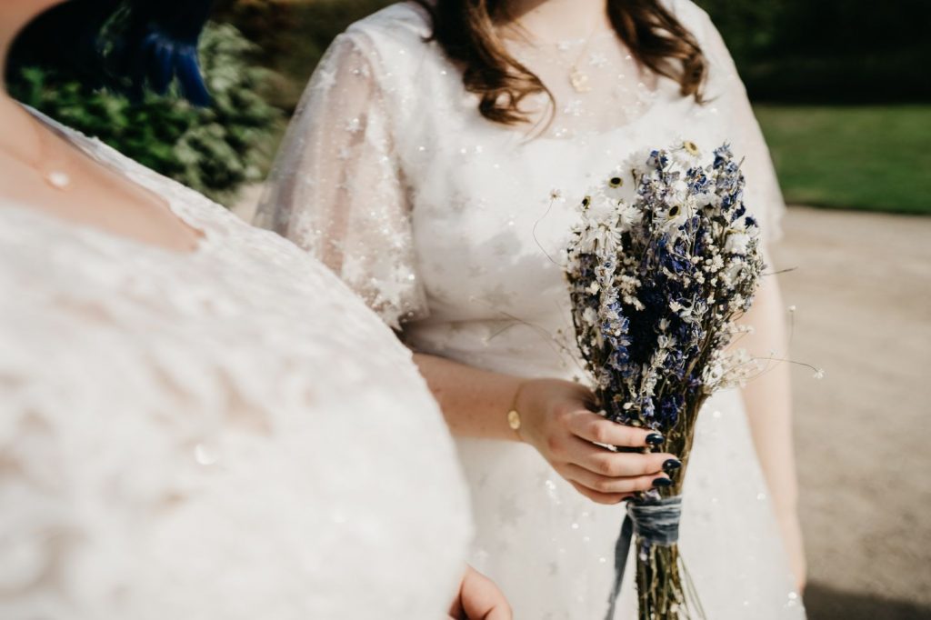 Queer wedding at Newton Hall for celestial brides  captured by David Boynton Wedding Photography