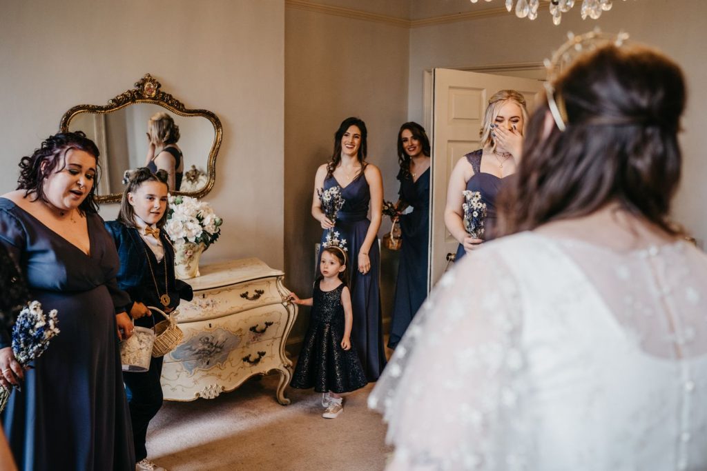 A joyous Queer wedding celebration at Newton Hall for celestial brides captured by David Boynton
