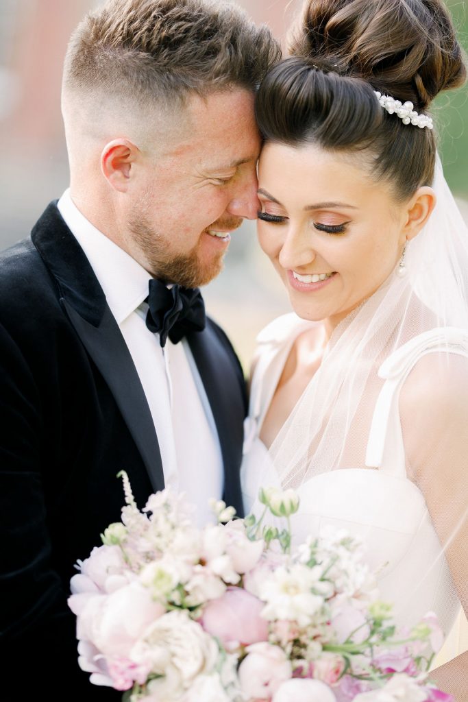 An elegant and romantic pink and gold wedding at Davenport House with two Milla Nova dresses