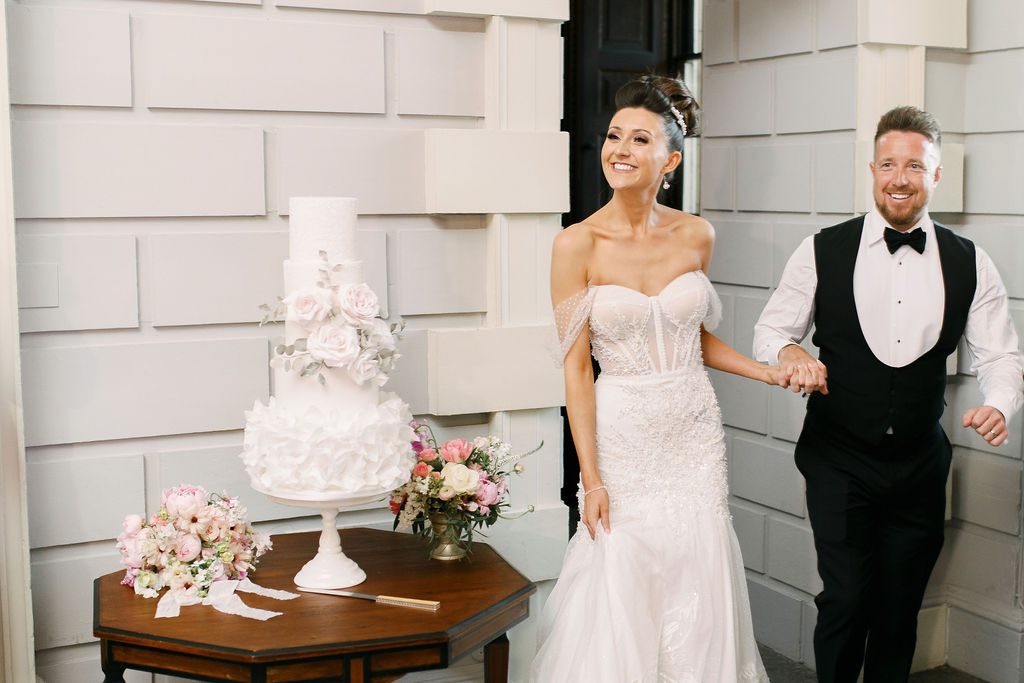 An elegant and romantic pink and gold wedding at Davenport House with two Milla Nova dresses