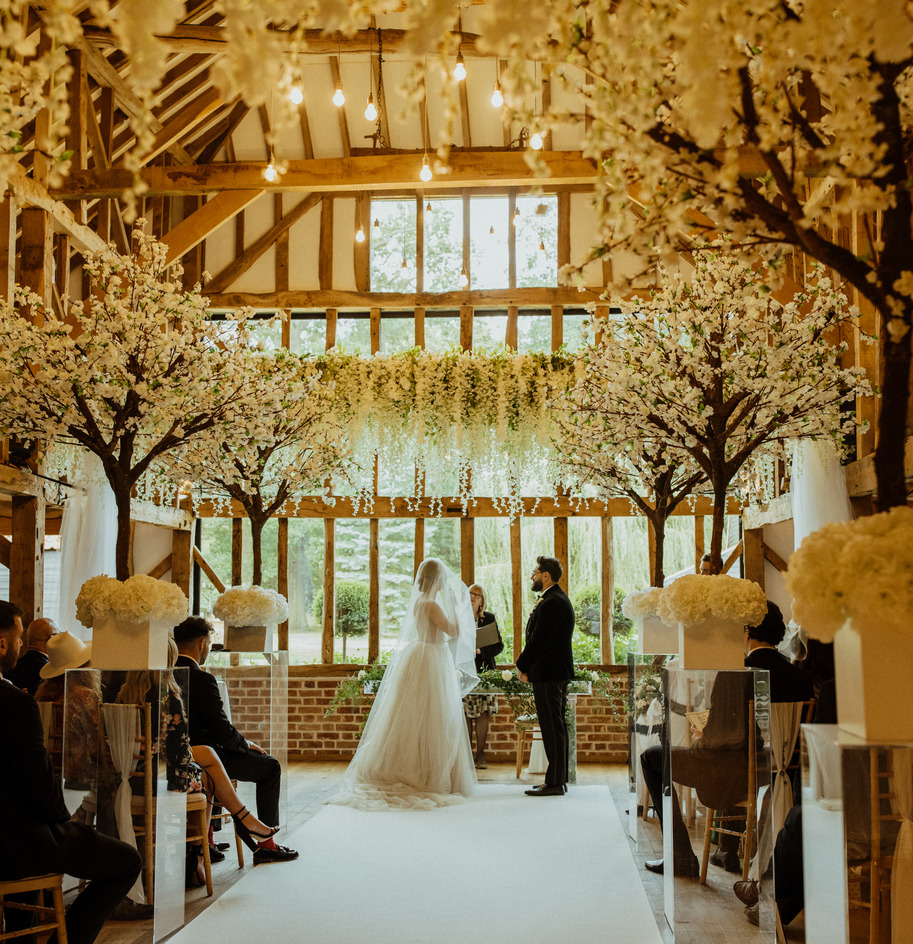 An evening outfit change for an elegant Autumnal bride at Blake Hall