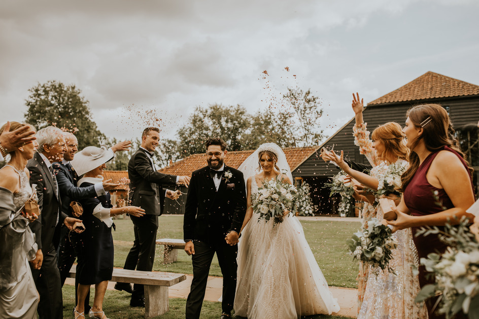 An evening outfit change for an elegant Autumnal bride at Blake Hall