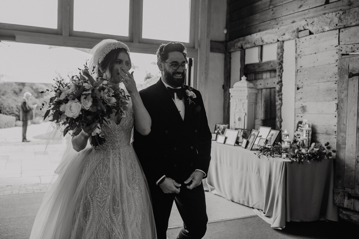 An evening outfit change for an elegant Autumnal bride at Blake Hall