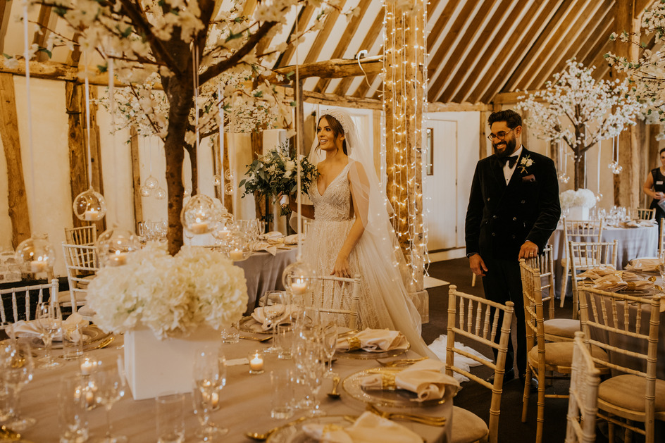 An evening outfit change for an Autumn bride at Blake Hall