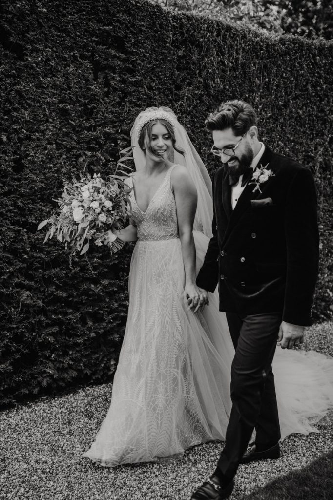 An evening outfit change for an elegant Autumnal bride at Blake Hall