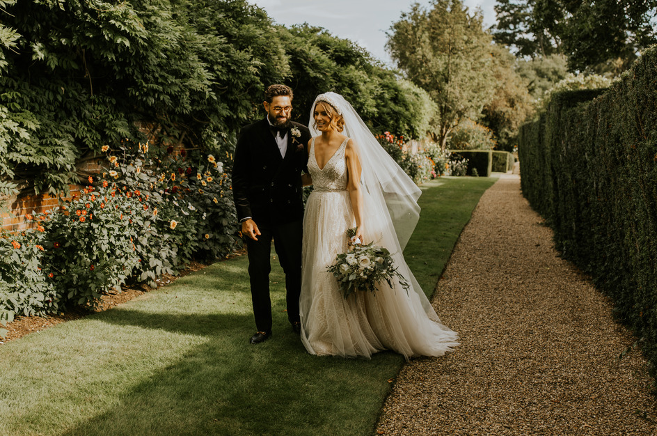 An evening outfit change for an elegant Autumnal bride at Blake Hall