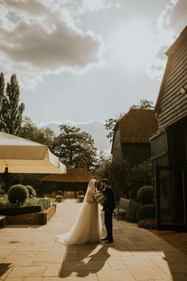 An evening outfit change for an elegant Autumnal bride at Blake Hall