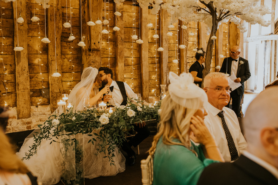 An evening outfit change for an elegant Autumnal bride at Blake Hall