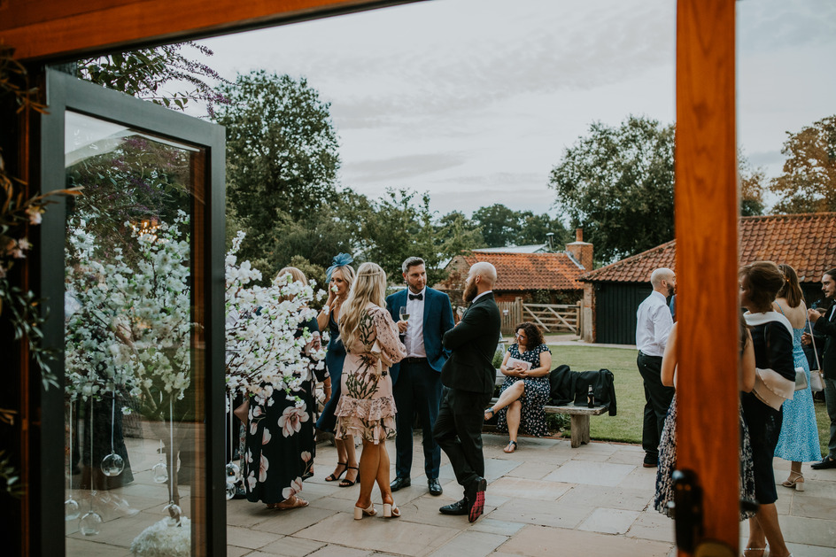 An evening outfit change for an elegant Autumnal bride at Blake Hall
