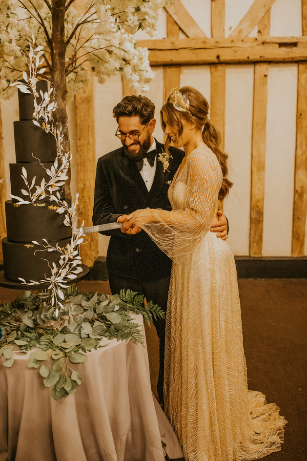 An evening outfit change for an elegant Autumnal bride at Blake Hall