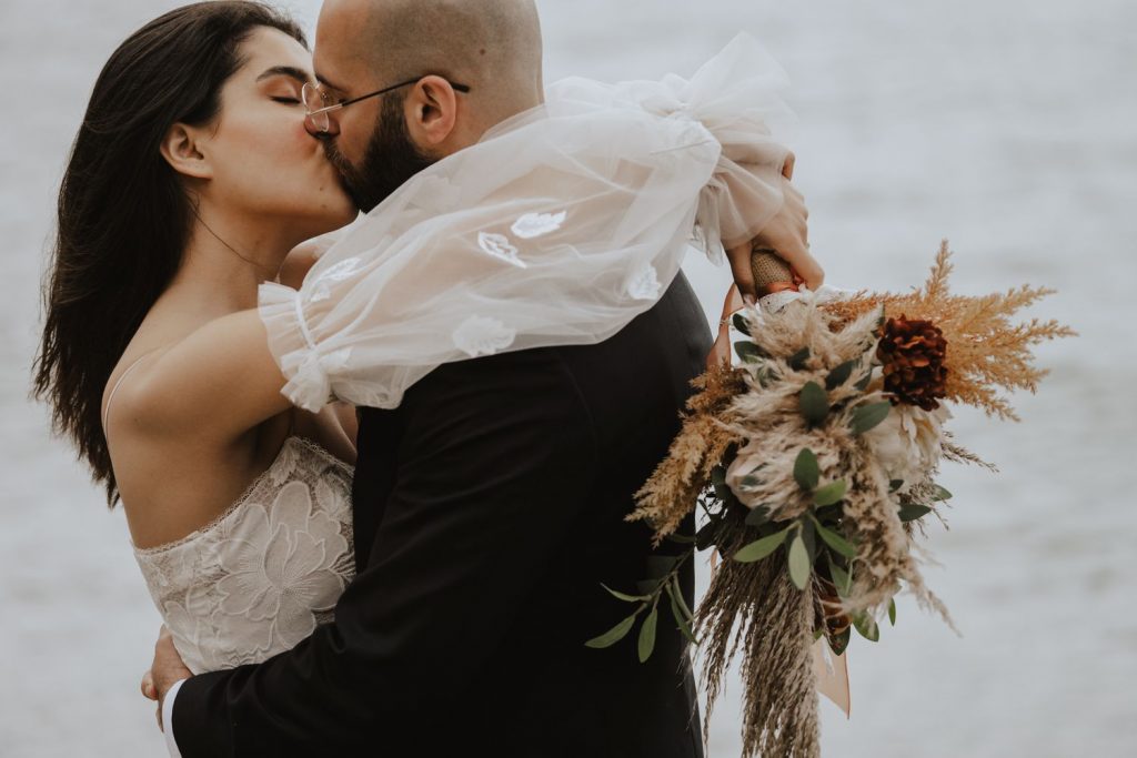 A bespoke wedding dress for a barefoot bride's beach elopement