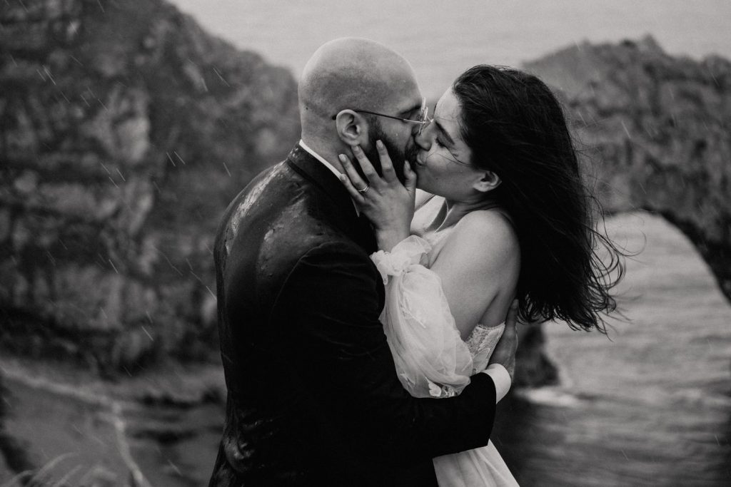 A bespoke wedding dress for a barefoot bohemian bride and a rainy beach elopement