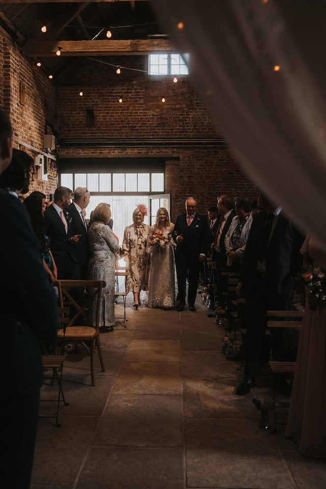 A spring boho wedding at The Barns in Yorkshire for Emily + Alex, captured by Firewood Film