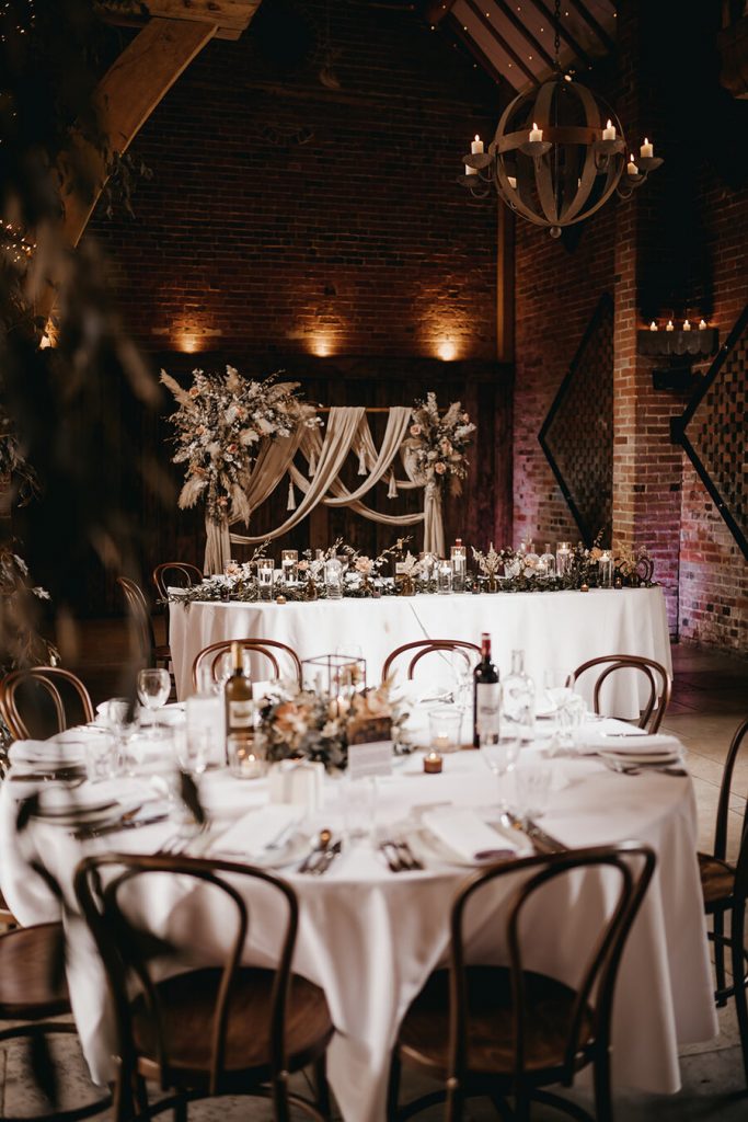 Modern boho styling by Willow & Wild Floral Events for a barn wedding
