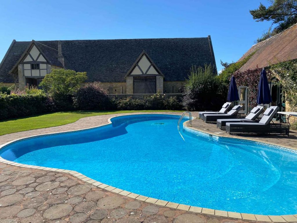 The outdoor swimming pool at Gloucestershire's wedding venue Bredon Manor,