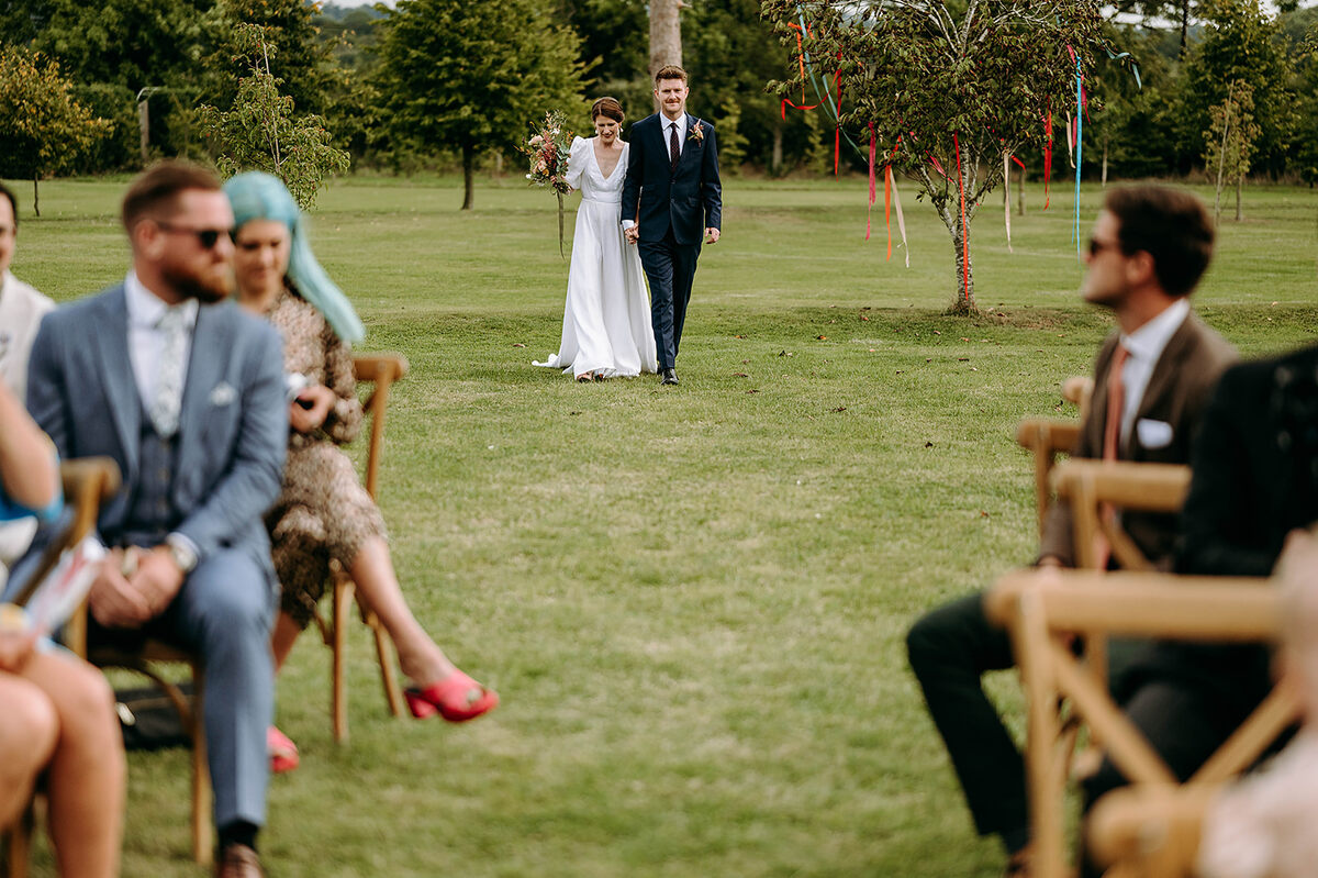 A colourful Autumnal wedding with an emotional outdoor ceremony