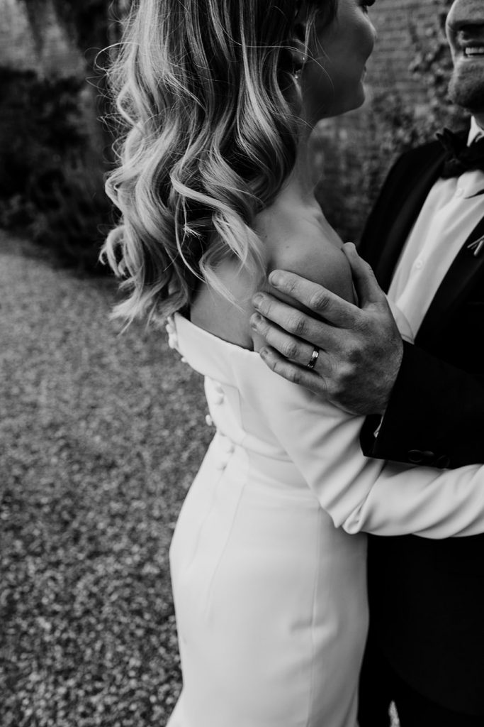 Minimalist wedding style for bride Sophie in a long sleeved Milla Nova dress