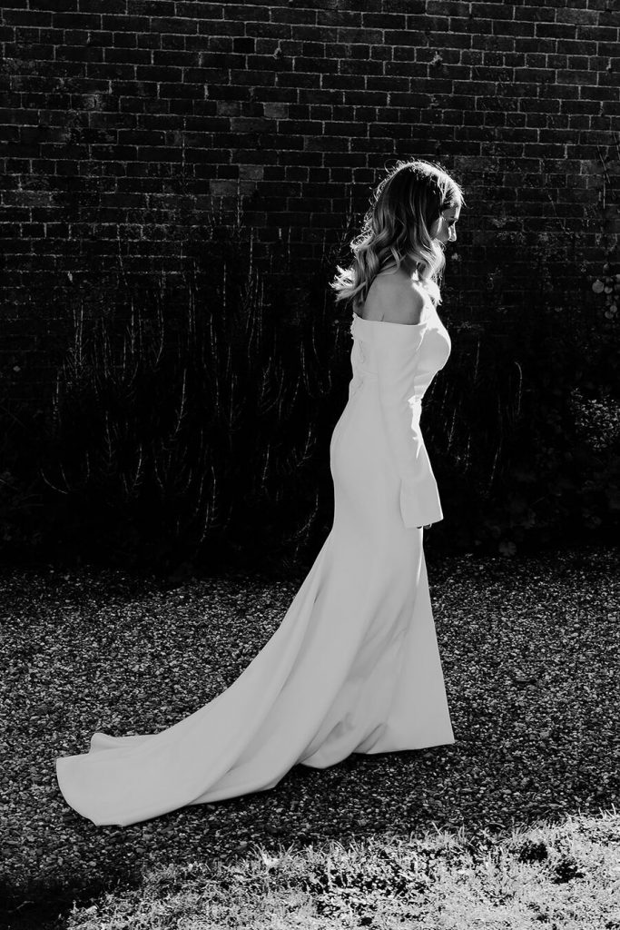 Minimalist wedding style for bride Sophie in a long sleeved Milla Nova dress
