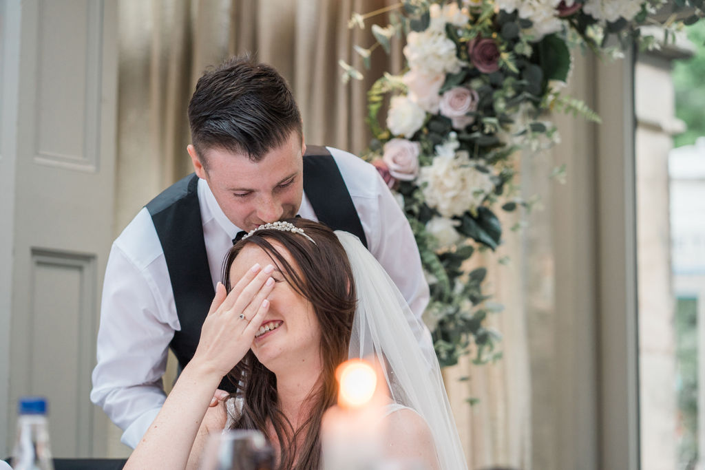 A surprise 'appearance' from Radio 1's Greg James for Jessica + Luke's wedding day at Hampton Manor