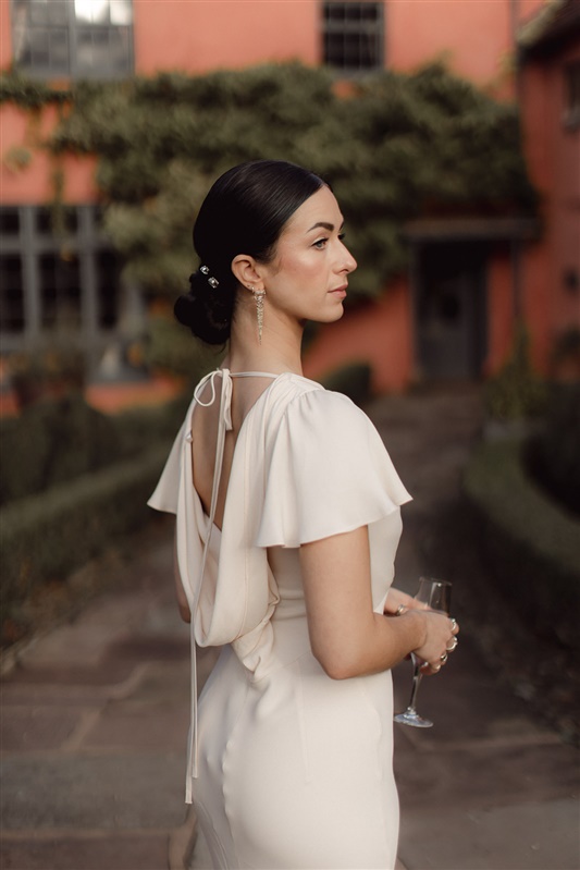 Sophisticated sleek bun elegant wedding hair style inspiration