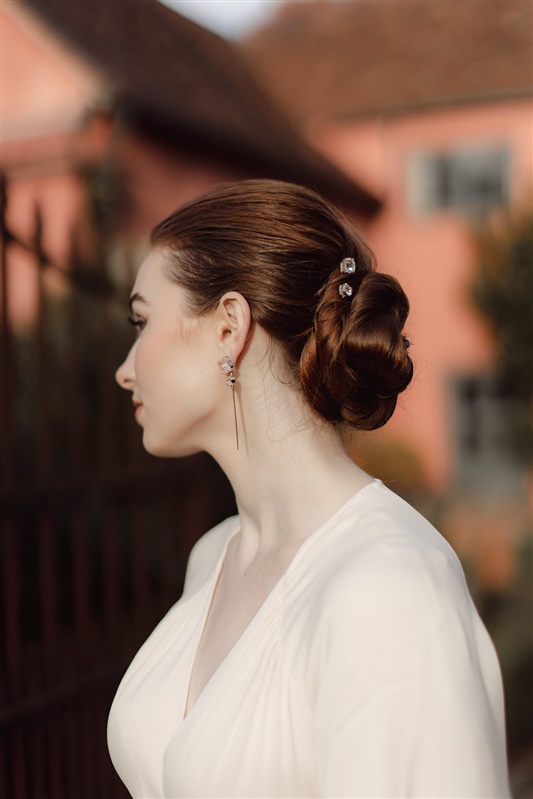 Sophisticated sleek bun elegant wedding hair style inspiration
