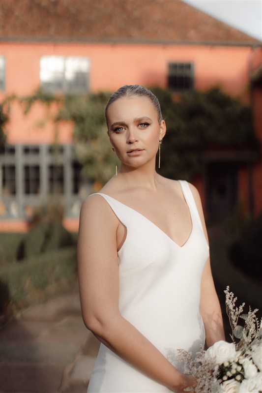 Sophisticated sleek bun elegant wedding hair style inspiration