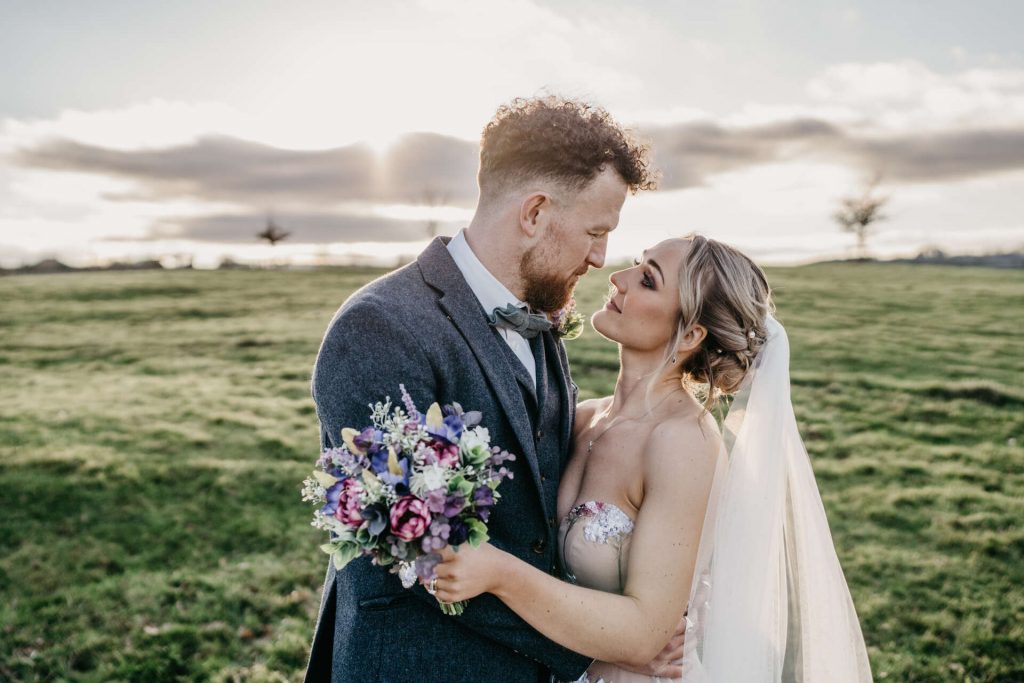 Hand painted wedding dress for a barn wedding