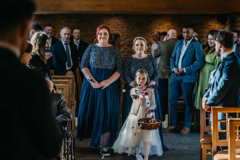 Paige + Ash's wedding day at Dodford Manor featuring a colourful hand painted wedding dress by Savin London