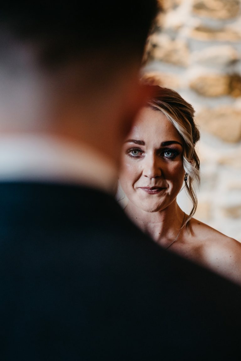 Paige + Ash's wedding day at Dodford Manor featuring a colourful hand painted wedding dress by Savin London