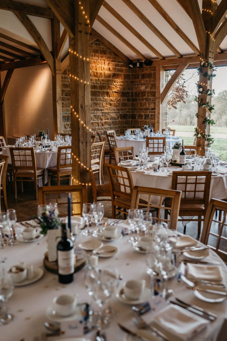 Paige + Ash's wedding day at Dodford Manor featuring a colourful hand painted wedding dress by Savin London