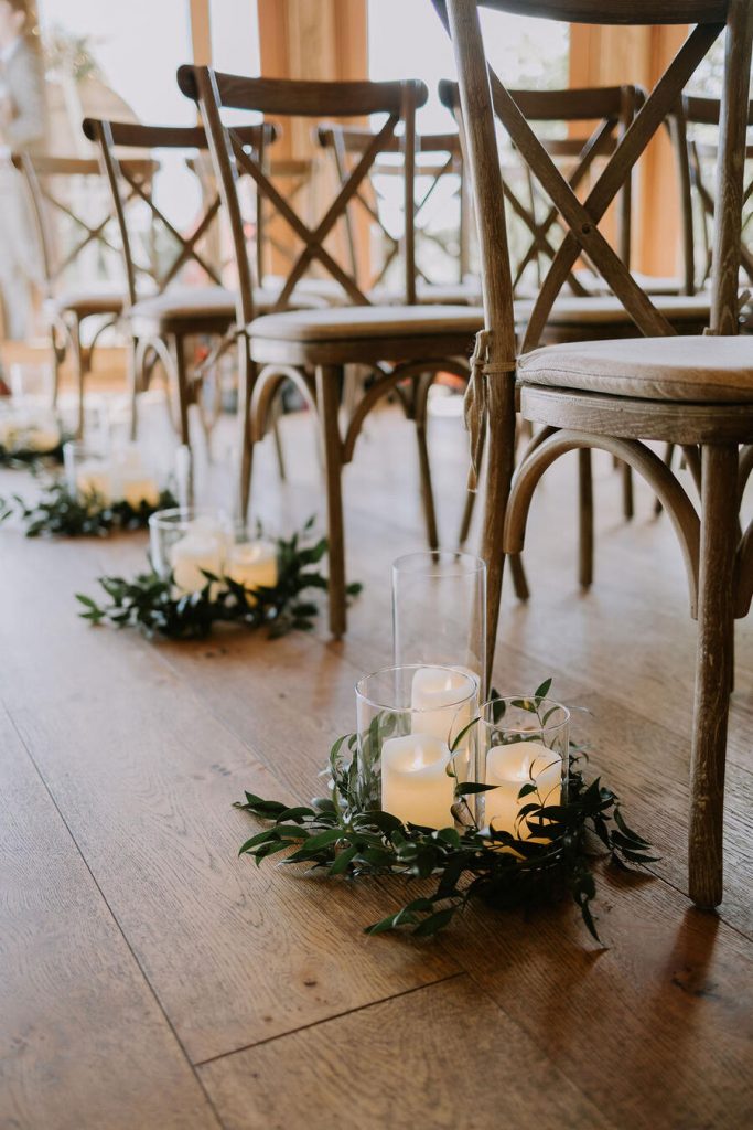 A warm, neutral colour palette with hints of wood, elevated with wildflowers and pampas