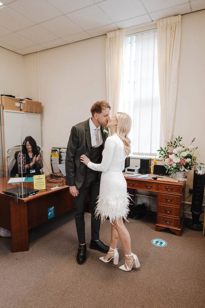 An intimate urban wedding featuring a dramatic Nadine Merabi skirt