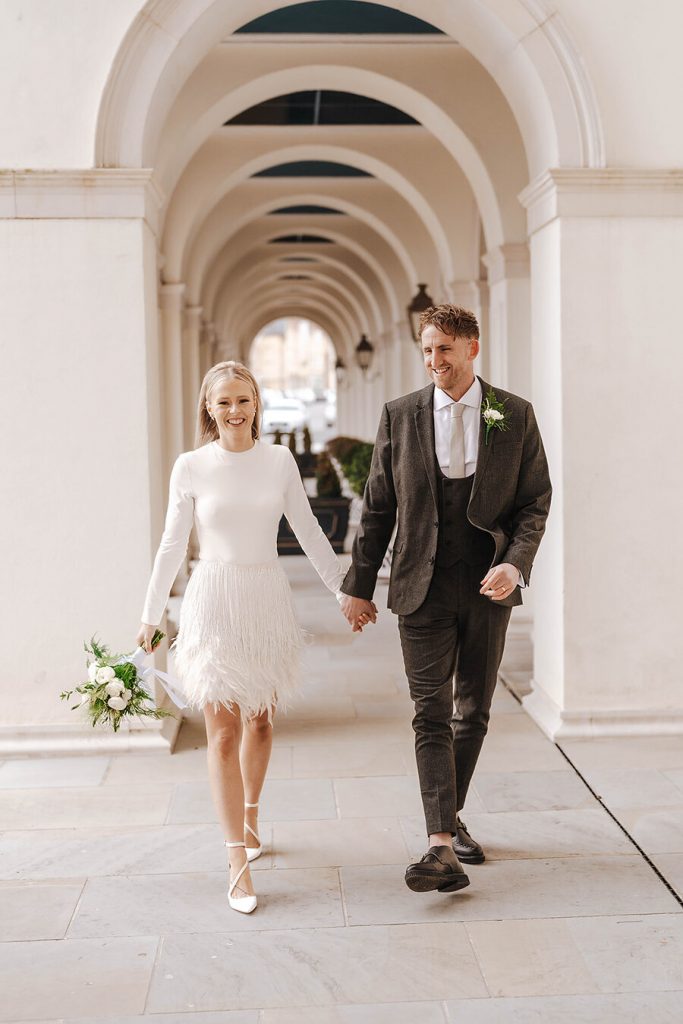 An intimate urban wedding featuring a dramatic Nadine Merabi skirt
