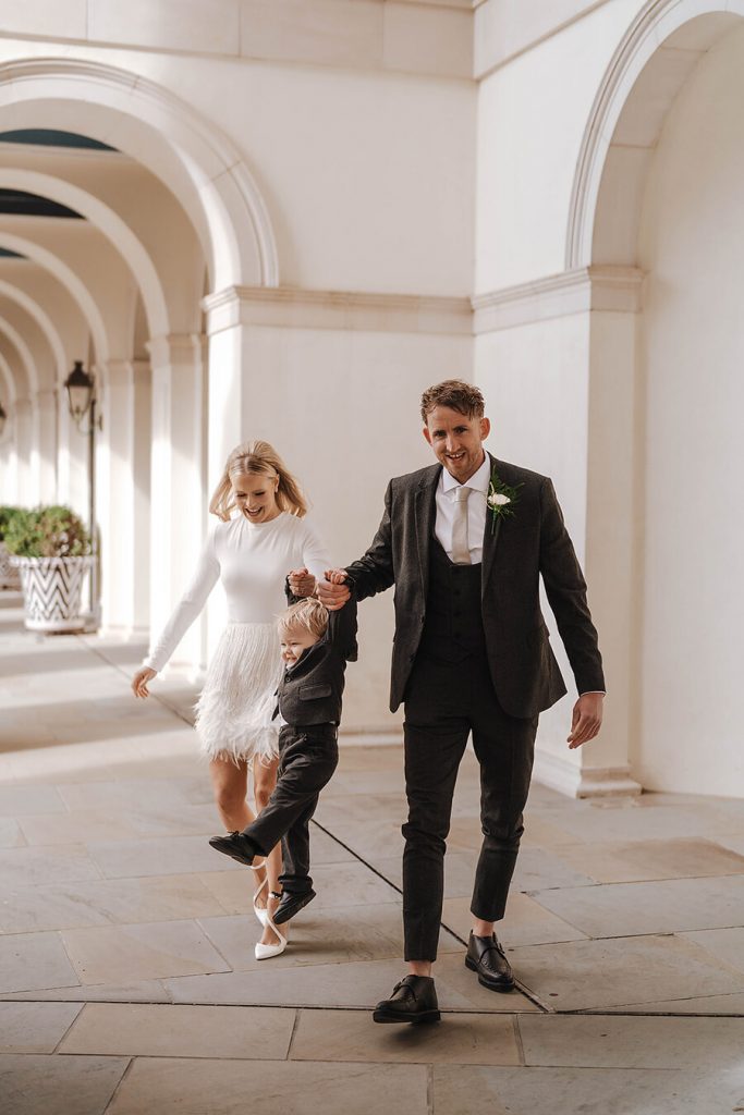 An intimate urban wedding featuring a dramatic Nadine Merabi skirt