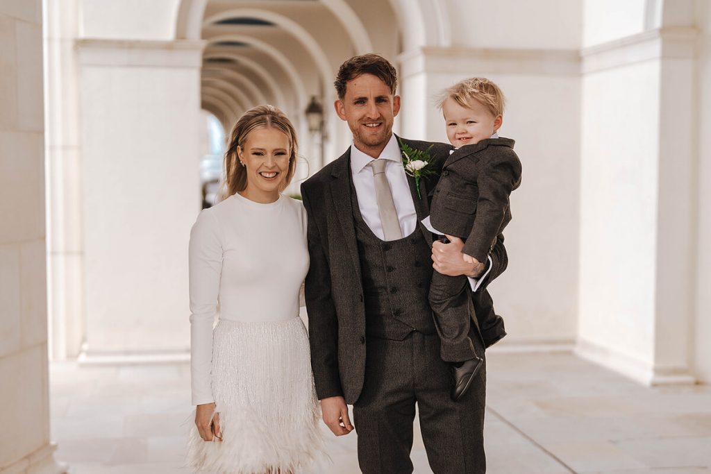 An intimate urban wedding featuring a dramatic Nadine Merabi skirt