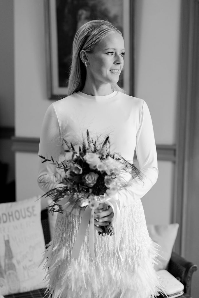 An intimate urban wedding featuring a dramatic Nadine Merabi skirt