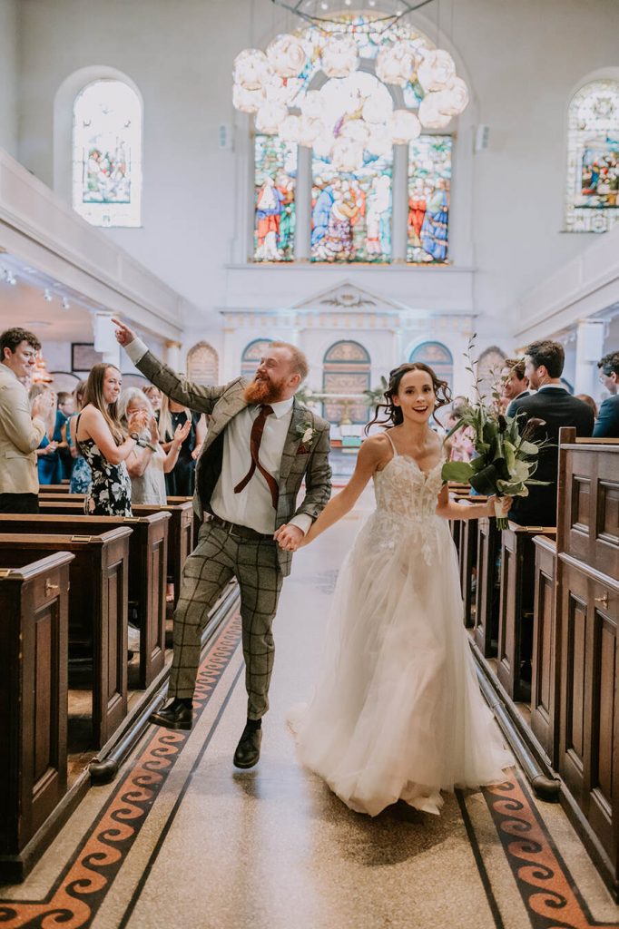 A joyous Church exit for Tess + David following their uplifting London wedding ceremony