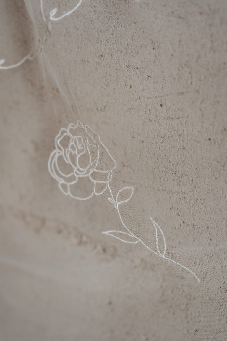 Embroidered custom veils crafted by British bridal designer Rebecca Anne Designs