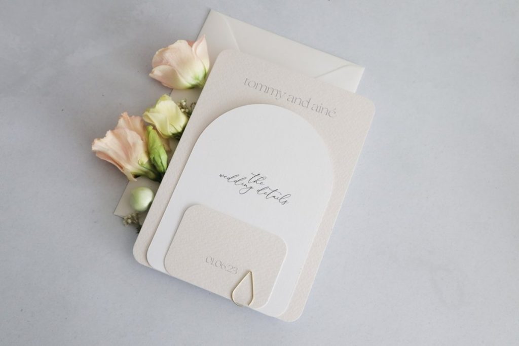 Love Flora Studio cream and stone curved invitation suite