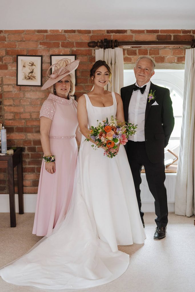 Beautiful bride Annabel wearing Sassi Holford at Wasing Park