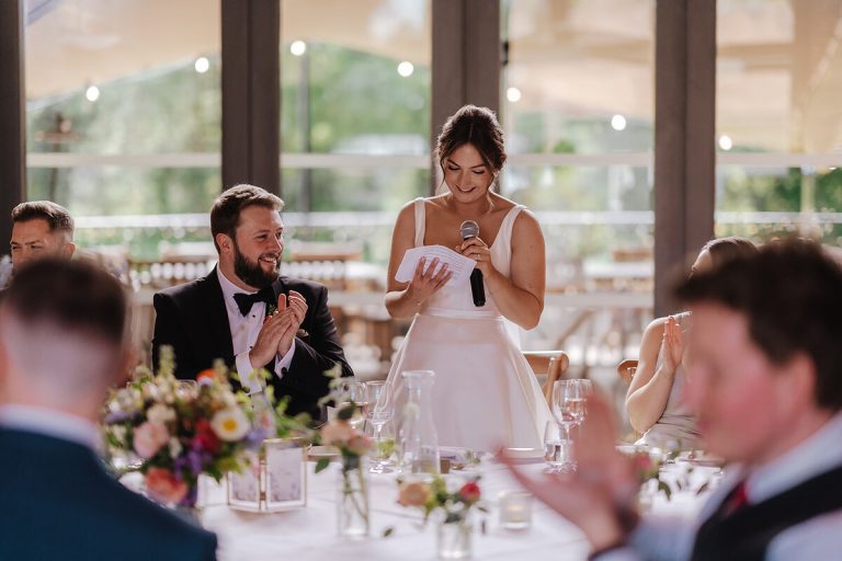 Bride Annabel mid speech during her Wasing Park wedding