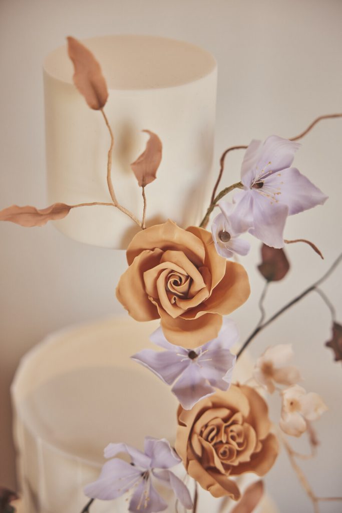 A contemporary wedding palette of lilac, mauve and burnt orange for vineyard wedding inspired by the Mediterranean sunset